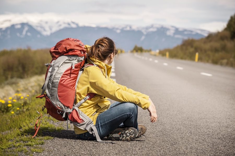 Female backpacker tourist in Icleand ready for adventure