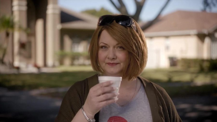 Karen sips on the hot chocolate she stole from her neighbors child. 
 (Image courtesy of IMDb)