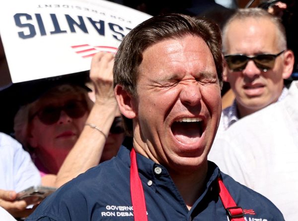 Ron DeSantis smiling very naturally on the campaign trail. (Scott Morgan/Reuters)