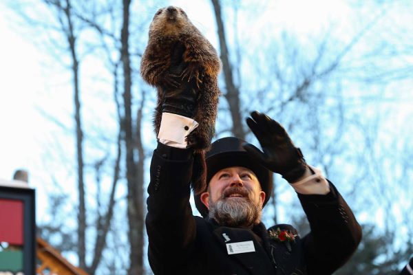 Punxsutawney Phil is raised in part of 2022s Groundhog Day celebrations. (Tayfun Coskun/Anadolu Agency via Getty Images)