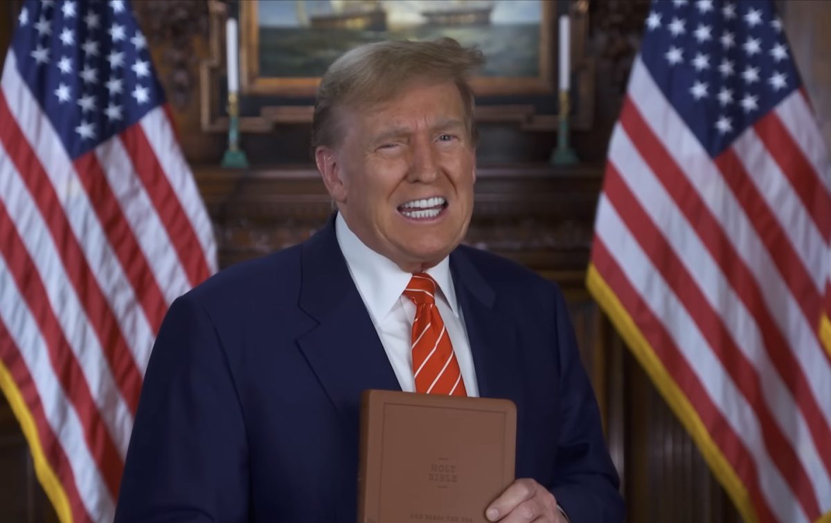 Donald Trump holds the God Bless The USA Bible. (Photo from Donald J. Trump)