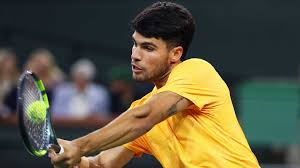 Carlos Alcaraz makes a shot at the Indian Wells tennis tournament